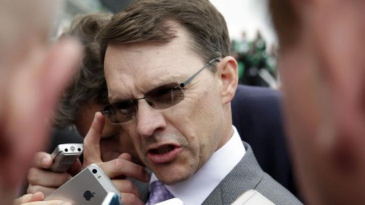 Aidan O'Brien surrounded by press.